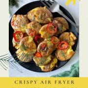 Pinterest Pin showing Air Fryer Smashed Potatoes coated in rosemary lemon chili vinaigrette.