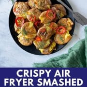 Pinterest pin showing air fryer smashed potatoes with a rosemary, chili, lemon vinaigrette.