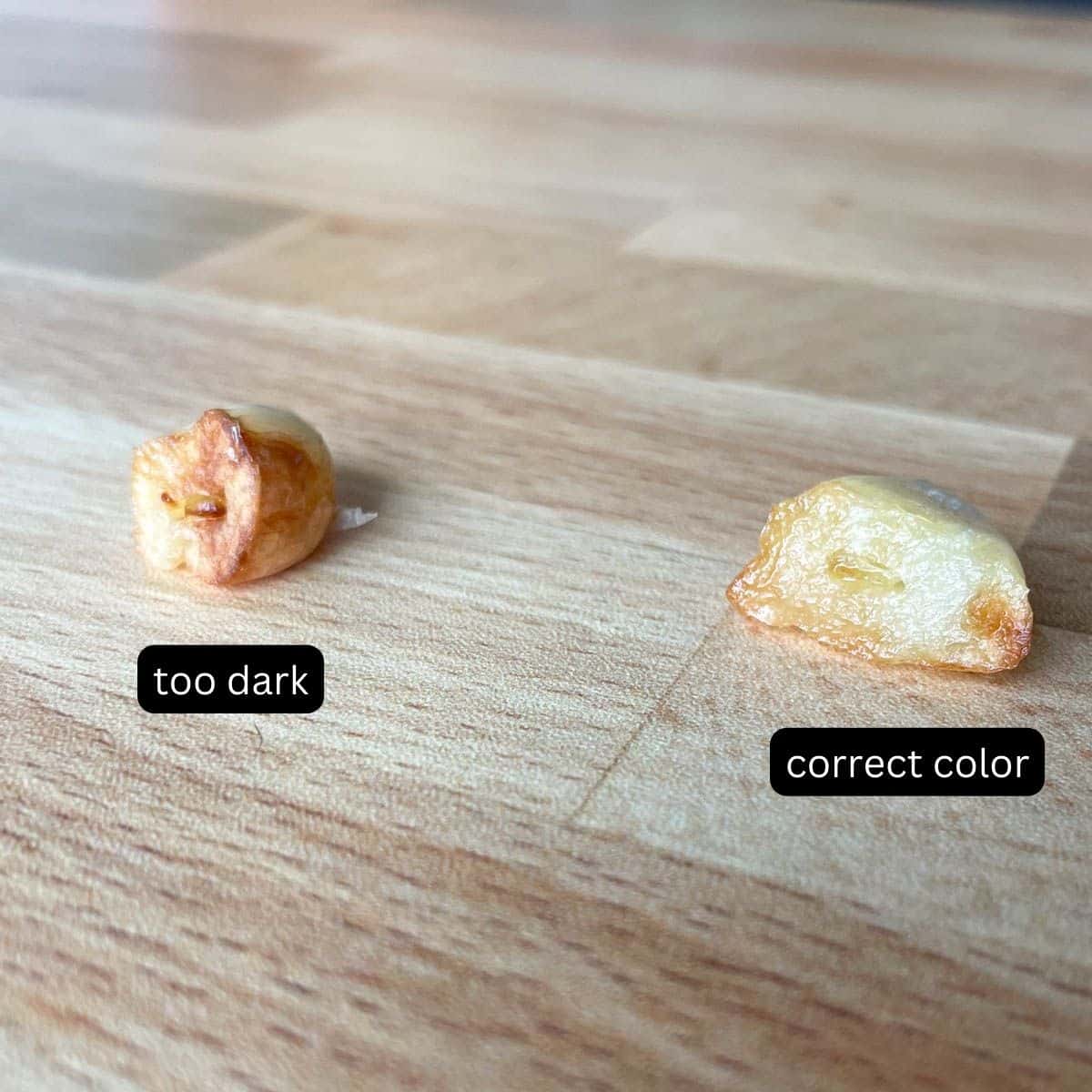 Two cloves of garlic are shown; one is dark brown and labeled "too dark", and the other is golden brown and labeled "correct color."