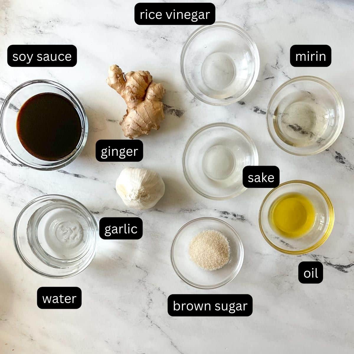 The labeled ingredients for yaki udon marinade are shown on a white marble counter.