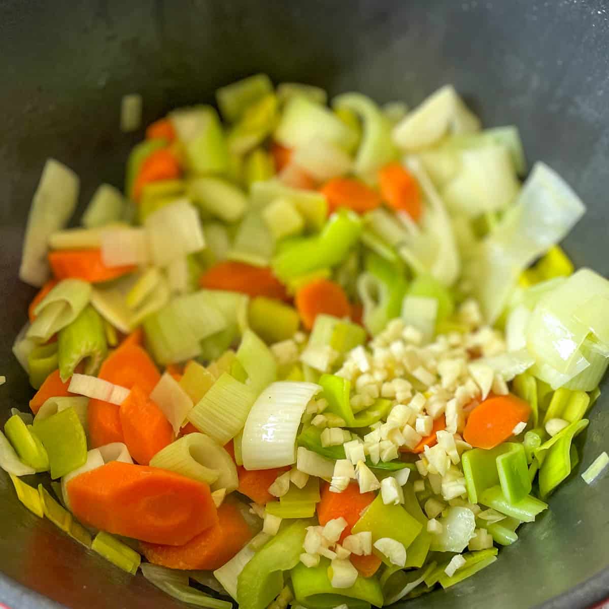 Garlic is added to the pot.