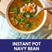 A bowl of Instant Pot Navy Bean Soup is shown with the URL www.twocloveskitchen.com.