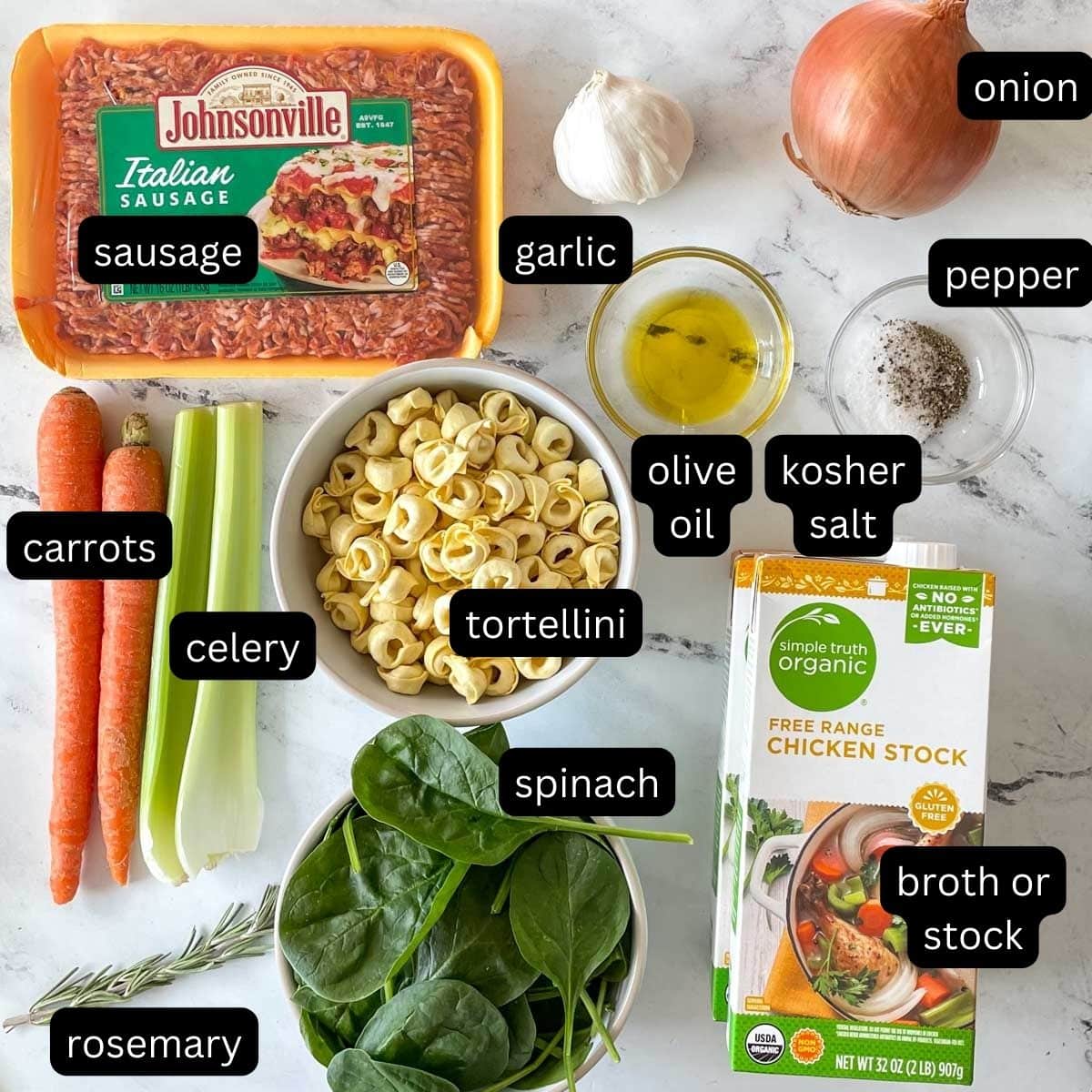 The ingredients for Instant Pot Tortellini Soup are shown on a white marble counter.