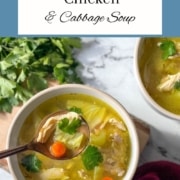 A bowl of soup is shown with the words Chicken and Cabbage Soup and the URL www.twocloveskitchen.com.