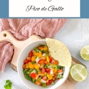 A bowl of salsa is shown with the words Mango Pico de Gallo and the URL www.twocloveskitchen.com.