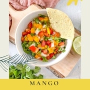 A bowl of salsa is shown with the words Mango Pico de Gallo and the URL www.twocloveskitchen.com.