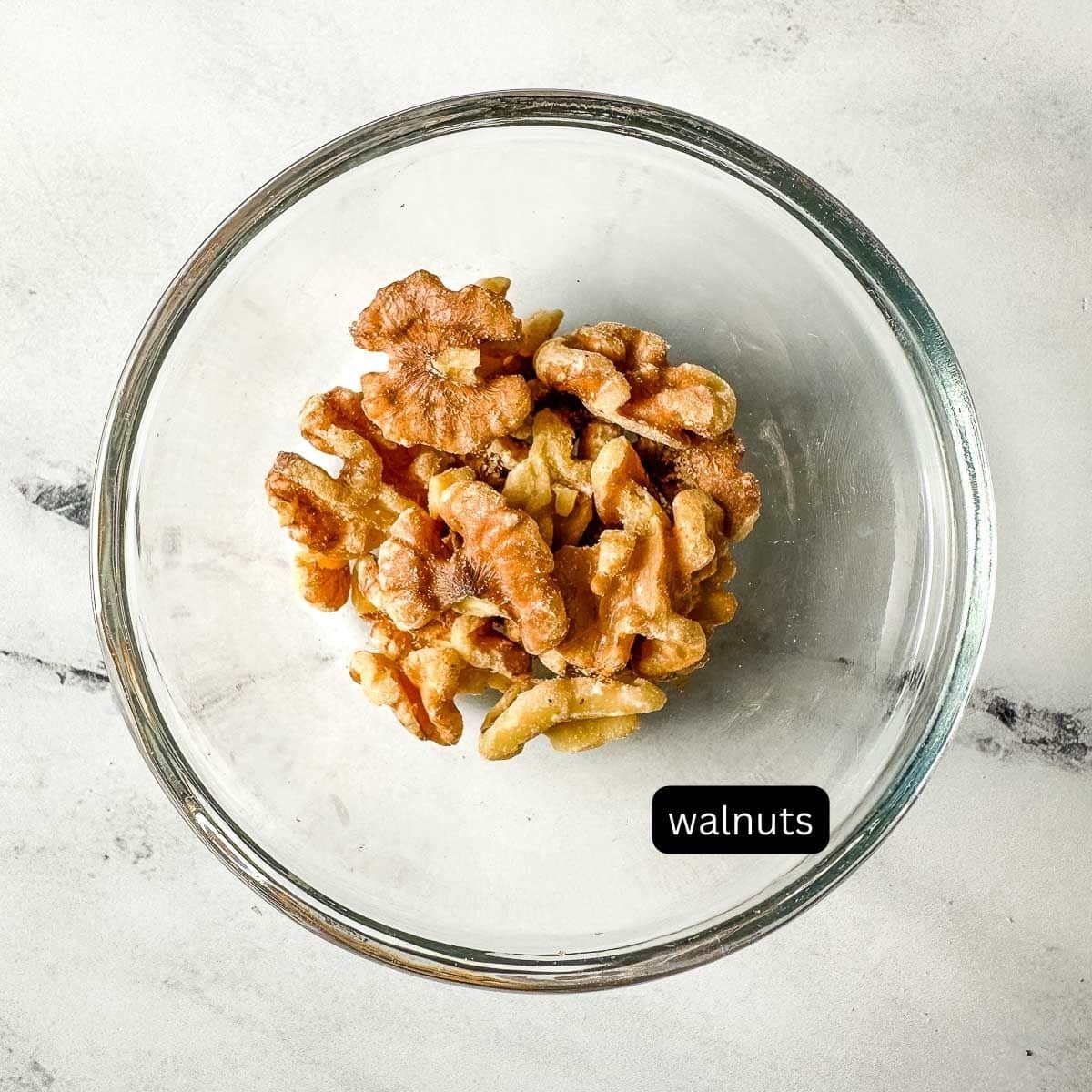 walnuts in a glass dish.