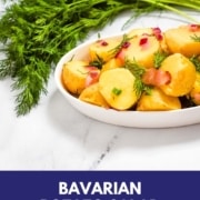 potato salad in a dish with the words Bavarian potato salad and the URL two cloves kitchen dot com.