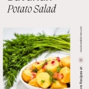potato salad in a dish with the words Bavarian potato salad and the URL two cloves kitchen dot com.