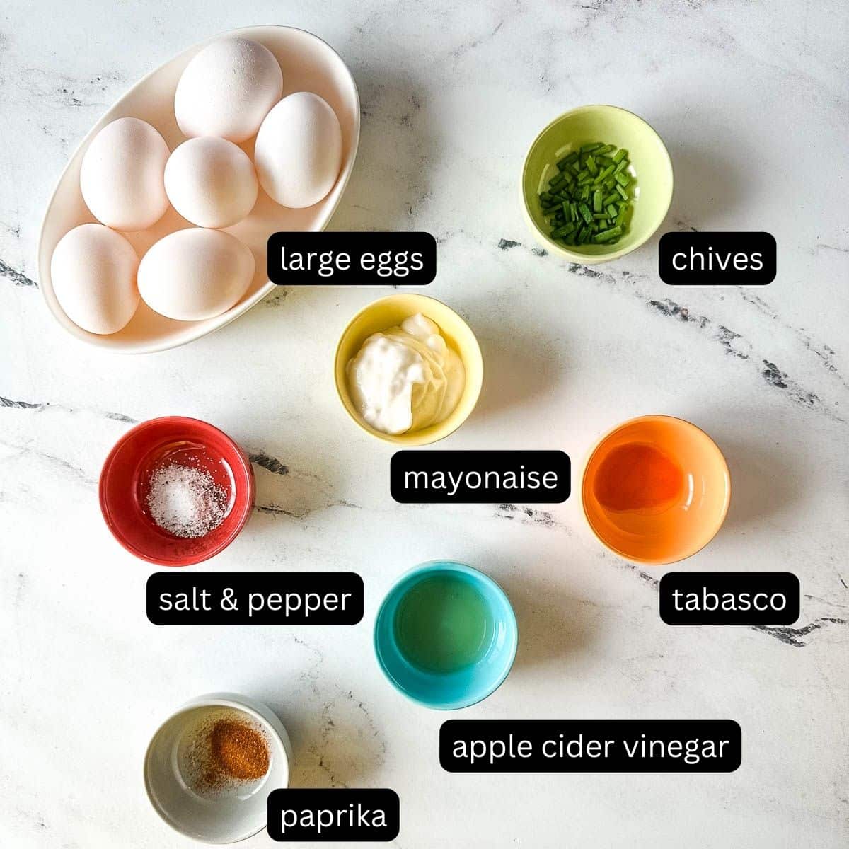 Labeled ingredients for deviled eggs without mustard.