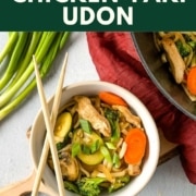 chicken stir-fry in a bowl with the words chicken yaki udon and the URL two cloves kitchen dot com.