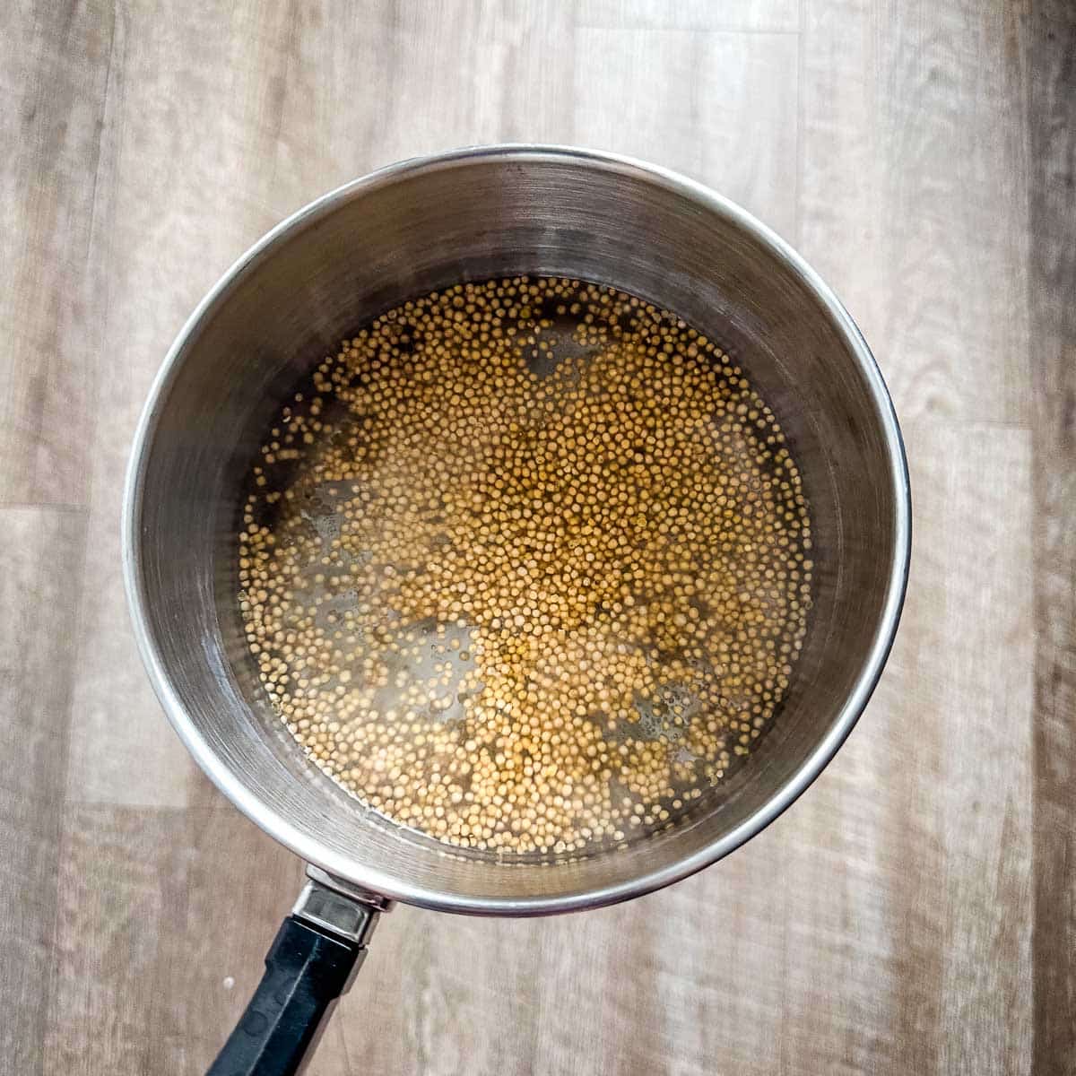 Mustard seeds in boiling water.