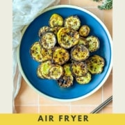 air fried zucchini and squash with the words air fryer zucchini and squash and the web address two cloves kitchen dot com.