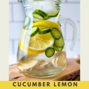 An image with infused water in a glass pitcher, the words cucumber lemon ginger water, and the web address for two cloves kitchen dot com.