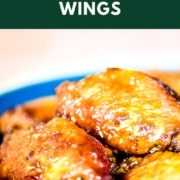 Soy garlic chicken wings are shown with the words Soy Garlic Wings and the web address two cloves kitchen dot com.