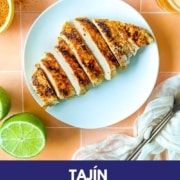 An image of grilled, sliced chicken with the words Tajin Grilled Chicken and the web address two cloves kitchen dot com.