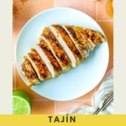 An image of grilled, sliced chicken with the words Tajin Grilled Chicken and the web address two cloves kitchen dot com.
