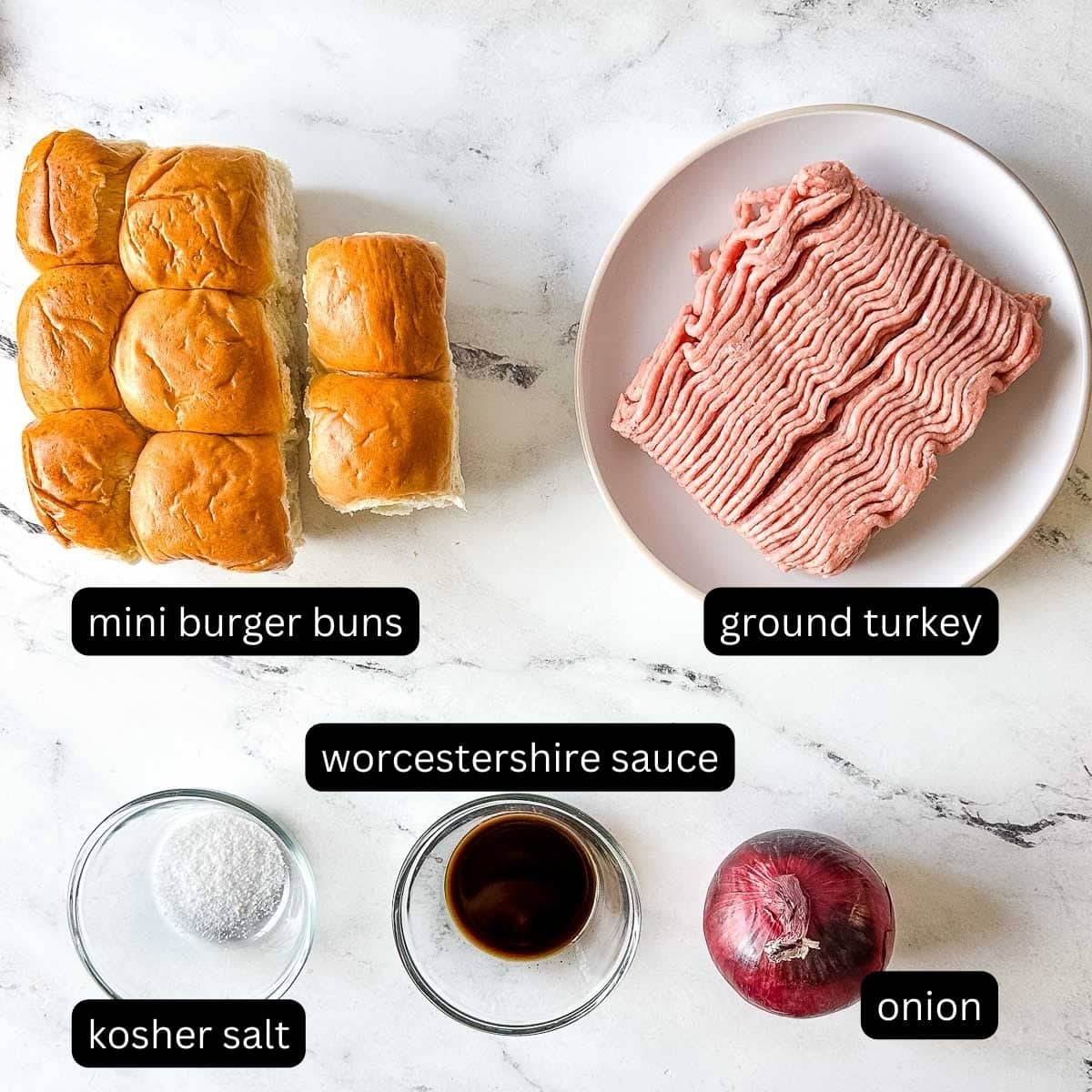 The labeled ingredients for turkey burger sliders on a white counter.