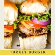 An image fo turkey burger sliders with the text Turkey Burger Sliders and the web address two cloves kitchen dot com.