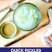 Image shows pickled white onions in a jar with the words quick pickled onions and the web address two cloves kitchen dot com.