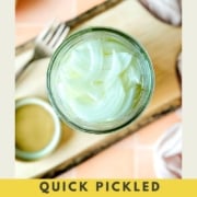 Image shows pickled white onions in a jar with the words quick pickled white onions and the web address two cloves kitchen dot com.