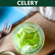 Pickled celery on a wooden cutting board with the text pickled celery and the web address two cloves kitchen dot com.