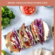 Pinterest graphic for blackened redfish tacos with cilantro lime crema.