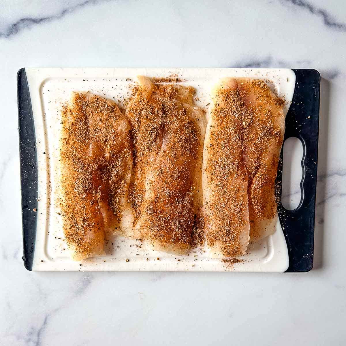 Fish fillets coated with blackening spice.