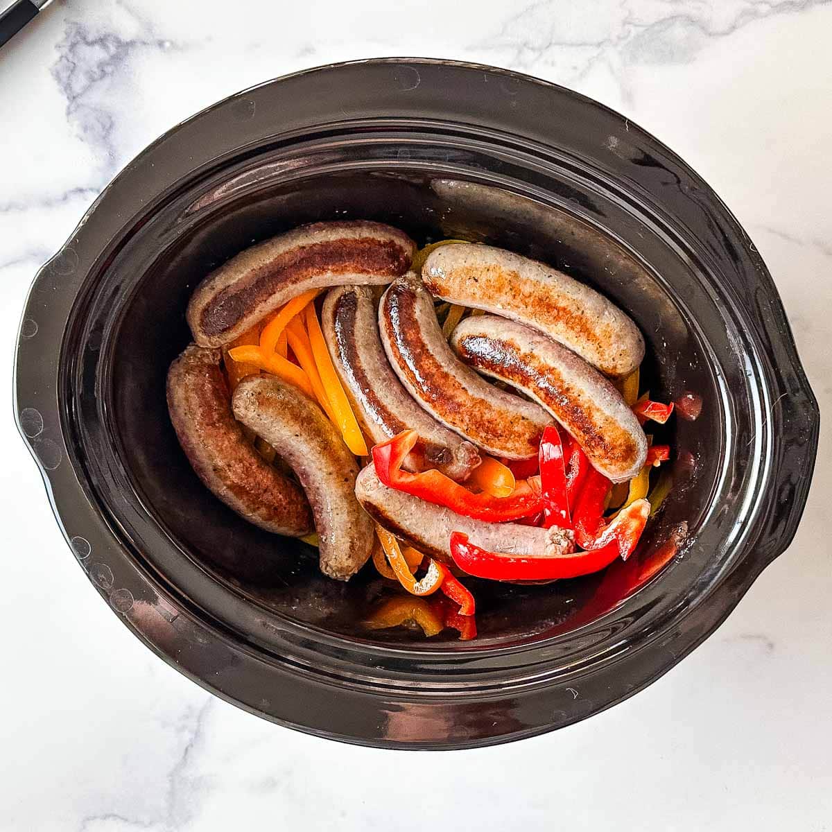 Sausage and peppers in a crock pot.