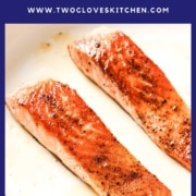 Two salmon fillets in a pan with the text pan - seared salmon.